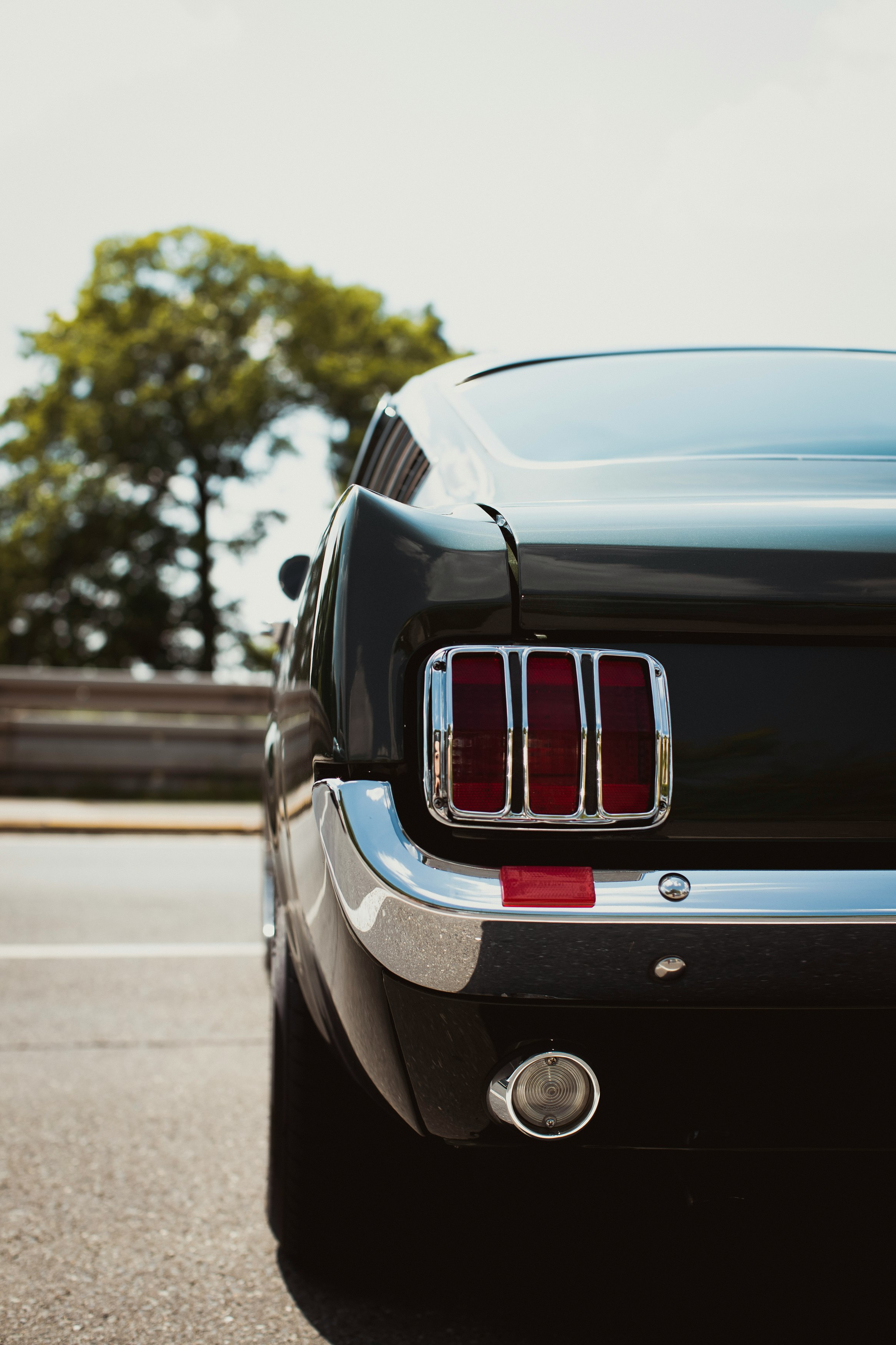 black car on road during daytime